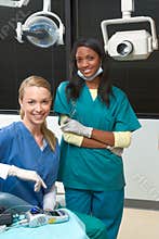 Multiethnic dentist office Caucasian and black