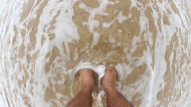 feet on the beach