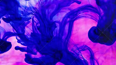 Ink colours in water.