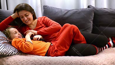 Loving Mother Caressing her Son