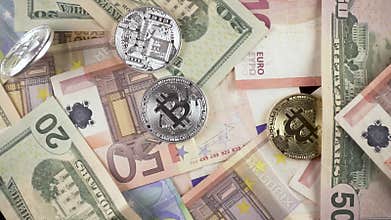 Slow motion coins fall for cash euros and dollars top view