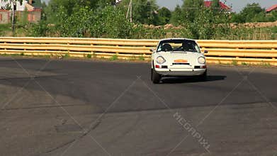 Sport car Porsche 911 taking part in vintage auto racing