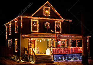 House decorated with Christmas lights at rural neighborhood