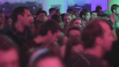 Crowd of young people clubbing, relaxing, dancing, nightlife