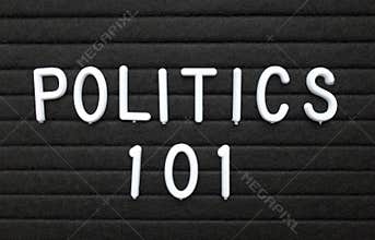 The words Politics 101 in white text on a letter board
