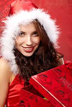 Christmas woman with a gift in her hands