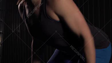 Strong Young Woman Working Out With Barbell