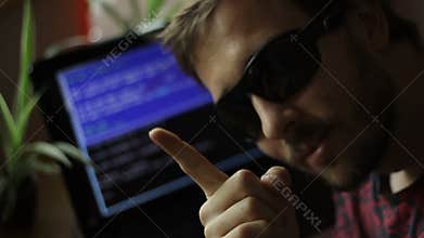 Hacker Stereotype Pointing at The Camera