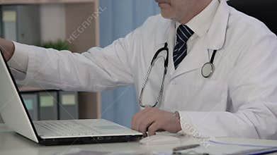 Department head finishing scientific article that will change world of medicine