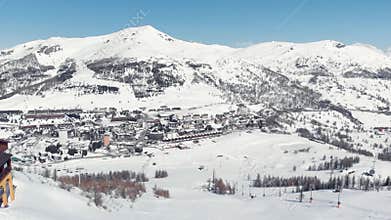 Sestriere Aerial view from drone, famous snow covered ski resort in the italian Alps