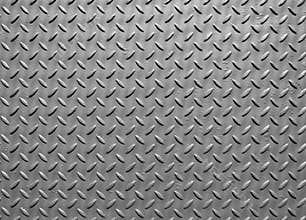 Grey steel metal plate with painted surface and industrial diamond pattern texture