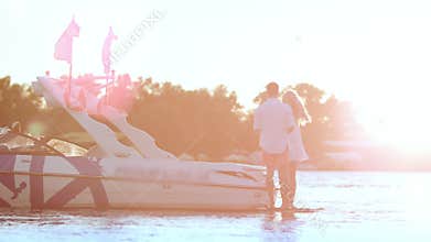 Happy couple relaxing together on yacht. Success and luxury lifestyle