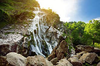 Majestic water cascade of Powerscourt Waterfall, the highest waterfall in Ireland.