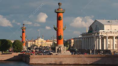 Rostral columns and old Stock exchange building on the Vasilievsky Island in the sunset