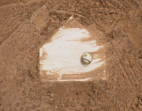 Baseball on home plate