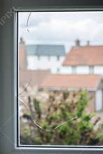 Crack in glass window pane.