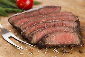 Cooked beef steak sliced medium rare close-up