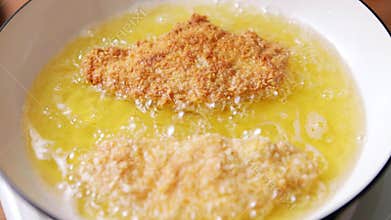 Frying Japanese chicken katsu in pan