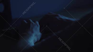 Young Hacker doing Attack on Data Servers and bank`s account to still the secret credit card numbers. Fast Typing on the