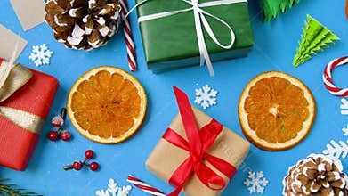Christmas gifts and decorations on blue background