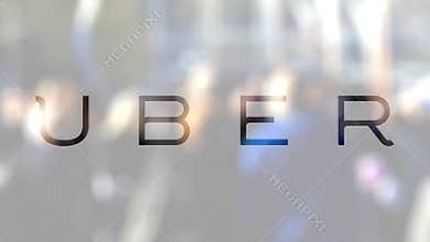 Uber Technologies Inc. logo on a glass against blurred crowd on the steet. Editorial 3D rendering