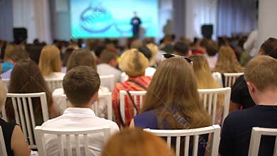 Anonymous speaker teaching at international conference. Business People Seminar Conference Meeting Office Training