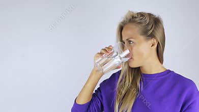Woman drinks water