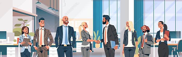 Business people group hand shake agreement communicating concept modern coworking office interior men women partnership