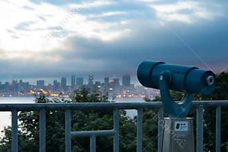 Coin operated viewfinder pointing Seattle skyline