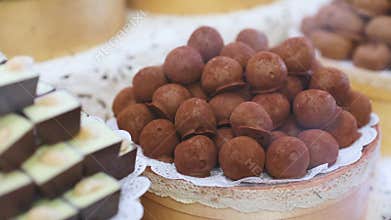Chocolate store. Chocolate sweets on shelves in shop