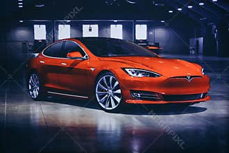 Photo of the image of an electric vehicle Tesla at the Tesla motor show in Berlin. A modern electric car.