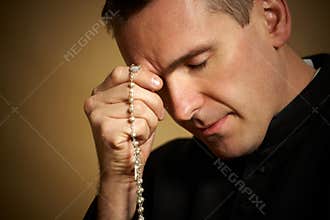 Praying priest