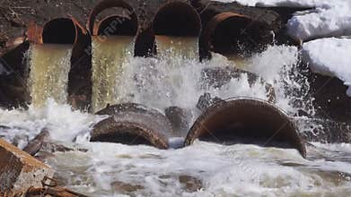 A large, old trumpet made of iron. From it flows water into the river sometimes dirty and harmful.