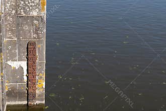 The tide level measurement scale close to the lock