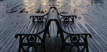 Two wet benches on Cromer pier.