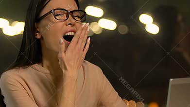 Overloaded sleepy lady yawning at workplace, having no new ideas, unemployment