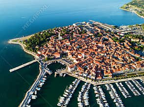 Aerial view of old town Izola in Slovenia, beautiful cityscape at sunset. Adriatic sea coast, peninsula of Istria, Europe