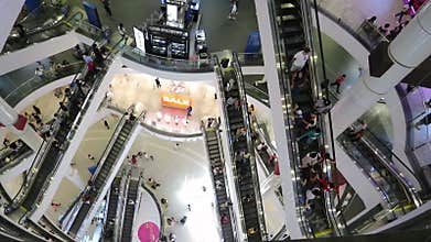Indoor above view of escalator and people shop in Terminal Shopping Mall, It is one of the big shopping centre in Bangkok