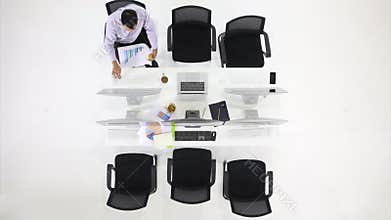 One man working alone in office.