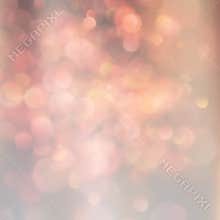 Blurred bokeh background orange and beige magical circles abstract out of focus background. EPS 10