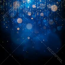 Blurred bokeh light on dark blue background. Christmas and New Year holidays template. Abstract glitter defocused