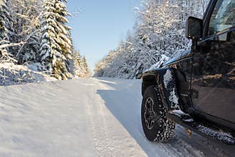 Jeep Wrangler Jk on winter road in Leningrad region