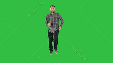 Man running on a Green Screen, Chroma Key.