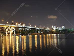 A bridge with light reflections on the water