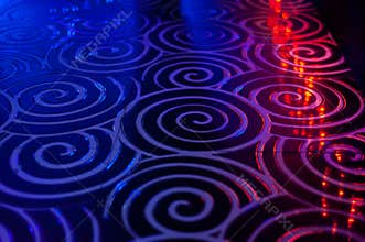 Club dance floor interior. spiral tile background whith bokeh reflection