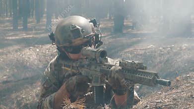 Soldier shoots from behind cover