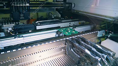Industrial machine is manufacturing electronic boards