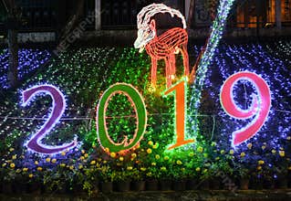 LED lights show on new year festival and glowing animal statue