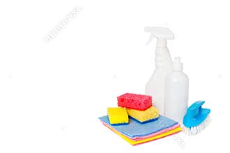 Different kinds of house cleaners and colorful sponges, gloves isolated on white. Cleaning background. Front view. Horizontal