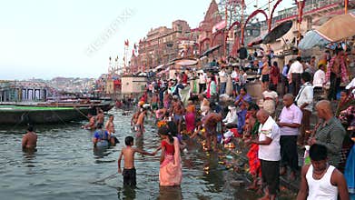 India, Varanasi, Ganga, 15 Mar 2019 - Hindu pilgrims offer prayers on the bank of holy Ganges river during sunrise in